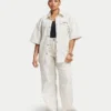 Camicia da donna in denim a pantaloncini con maniche corte Camicia da donna in denim a pantaloncini con maniche corte