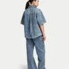 Camicia da donna in denim a pantaloncini con maniche corte Camicia da donna in denim a pantaloncini con maniche corte