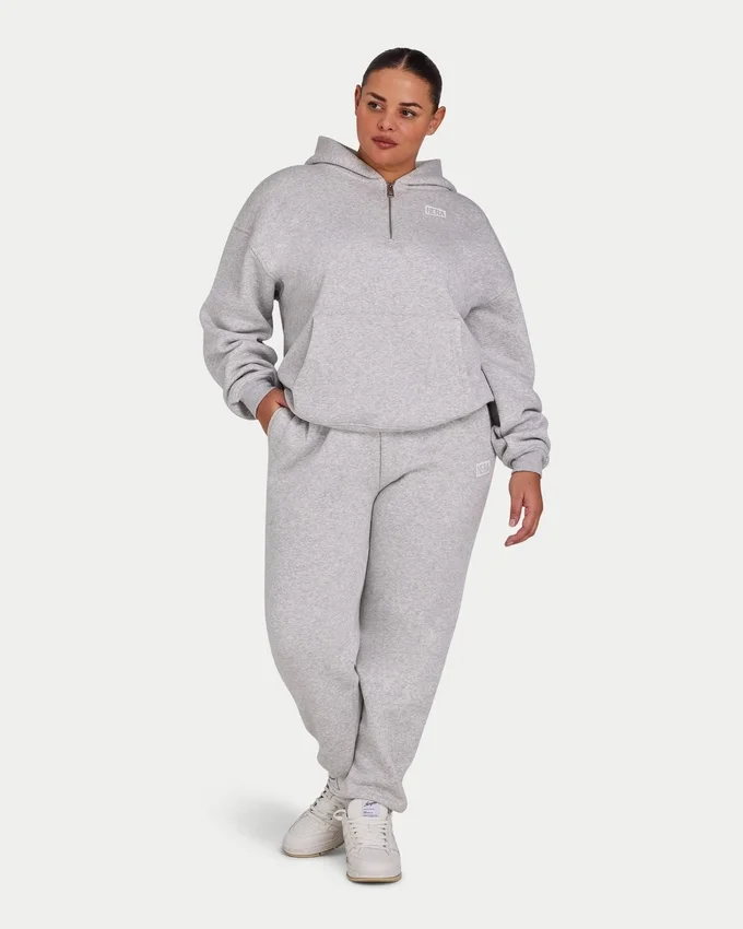Felpa con cappuccio da donna “Collective” – grigio melange Felpa con cappuccio da donna “Collective” – grigio melange