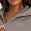 Felpa con cappuccio oversize da donna “Collective”