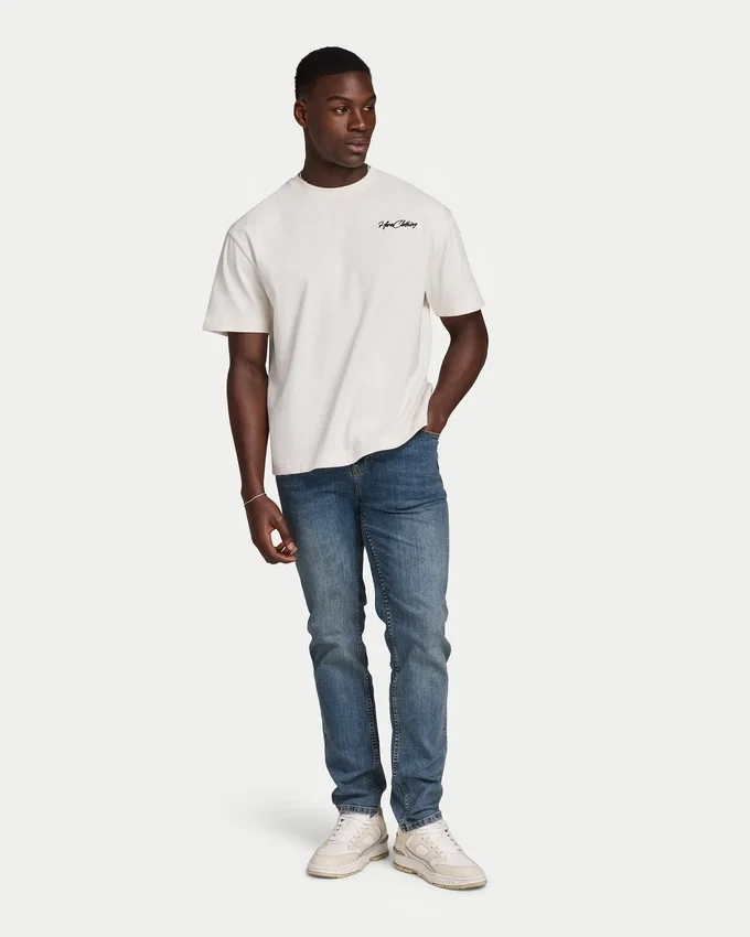 Jeans da uomo in Denim dal taglio morbido – lavaggio medio Jeans da uomo in Denim dal taglio morbido – lavaggio medio