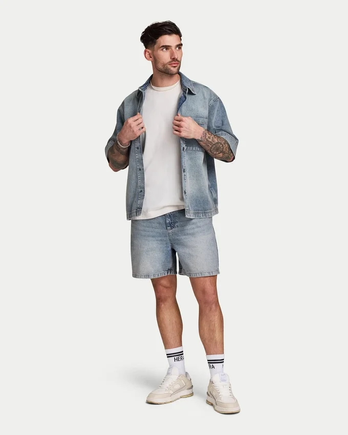 Pantaloncini in denim da uomo dal taglio rilassato Pantaloncini in denim da uomo dal taglio rilassato