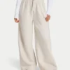 Pantaloni sportivi da donna a gamba larga della linea Collective Pantaloni sportivi da donna a gamba larga della linea Collective