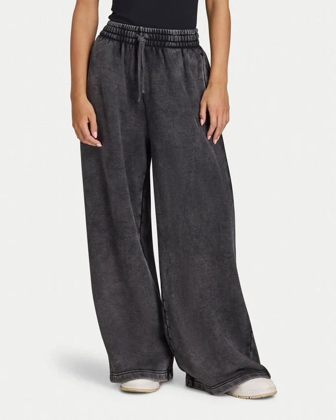Pantaloni sportivi da donna a gamba larga della linea Collective Pantaloni sportivi da donna a gamba larga della linea Collective