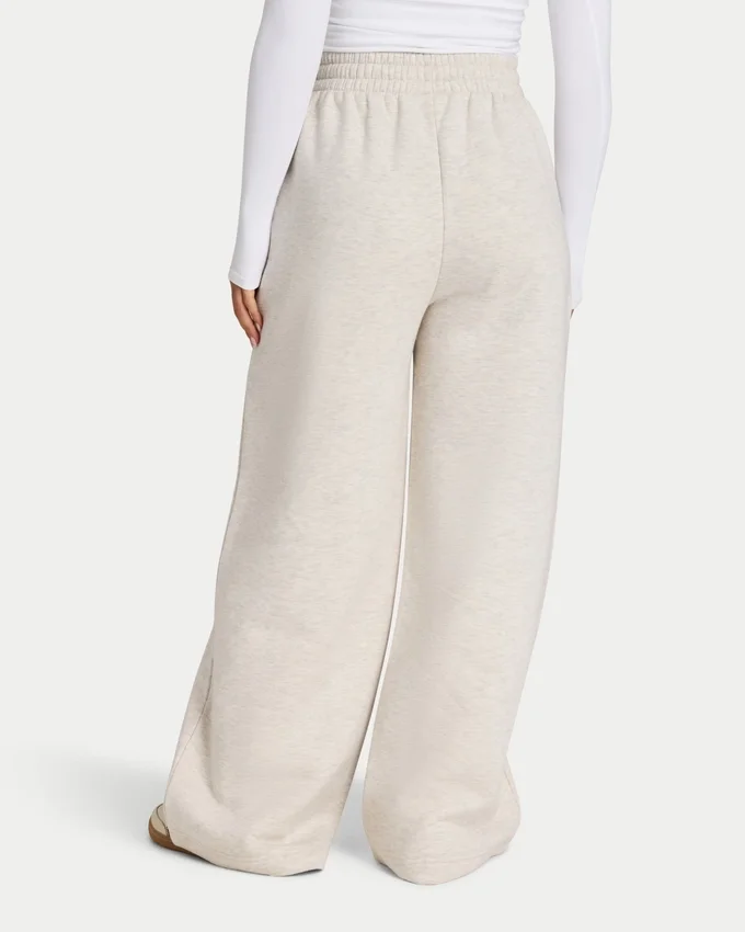 Pantaloni sportivi da donna a gamba larga della linea Collective Pantaloni sportivi da donna a gamba larga della linea Collective