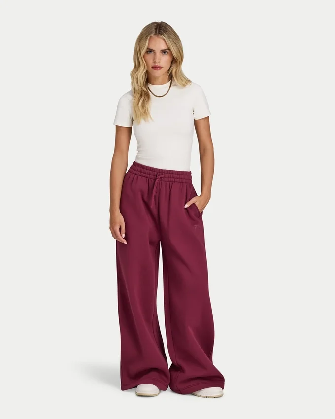 Pantaloni sportivi da donna a gamba larga della linea Collective Pantaloni sportivi da donna a gamba larga della linea Collective