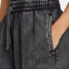 Pantaloni sportivi da donna a gamba larga della linea Collective Pantaloni sportivi da donna a gamba larga della linea Collective