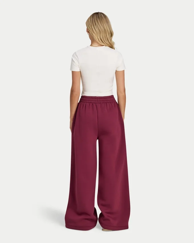 Pantaloni sportivi da donna a gamba larga della linea Collective Pantaloni sportivi da donna a gamba larga della linea Collective