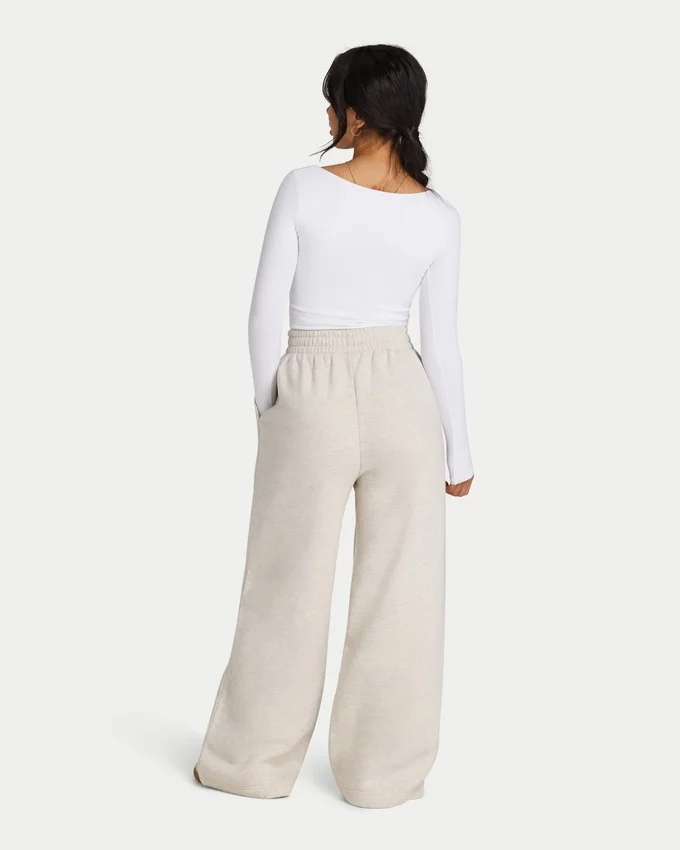 Pantaloni sportivi da donna a gamba larga della linea Collective Pantaloni sportivi da donna a gamba larga della linea Collective