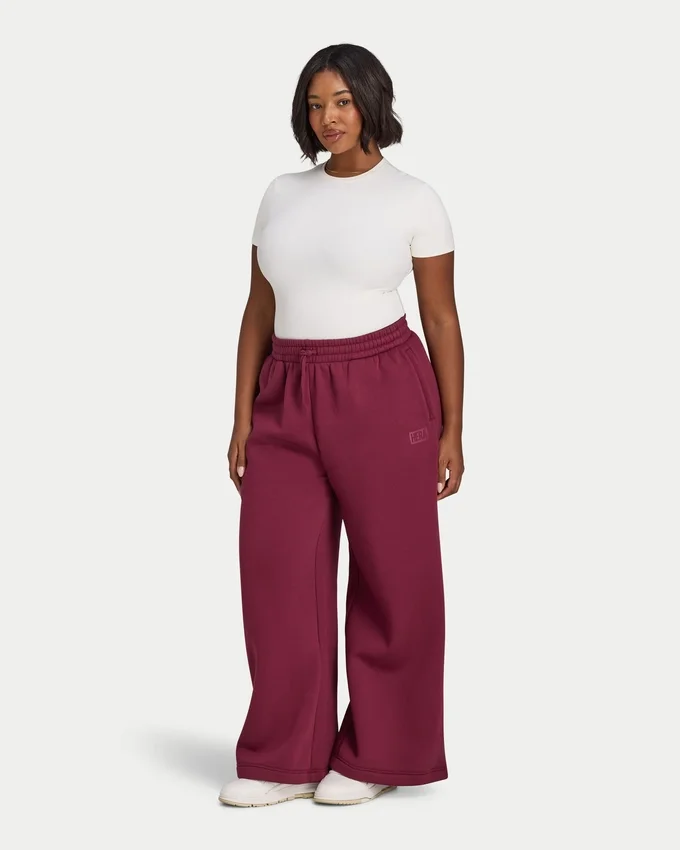 Pantaloni sportivi da donna a gamba larga della linea Collective Pantaloni sportivi da donna a gamba larga della linea Collective