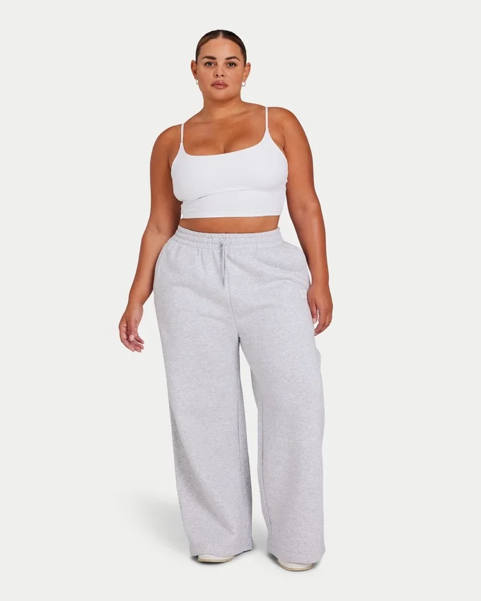 Pantaloni sportivi da donna Collective a gamba larga – grigio melange Pantaloni sportivi da donna Collective a gamba larga – grigio melange
