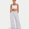 Pantaloni sportivi da donna Collective a gamba larga – grigio melange Pantaloni sportivi da donna Collective a gamba larga – grigio melange
