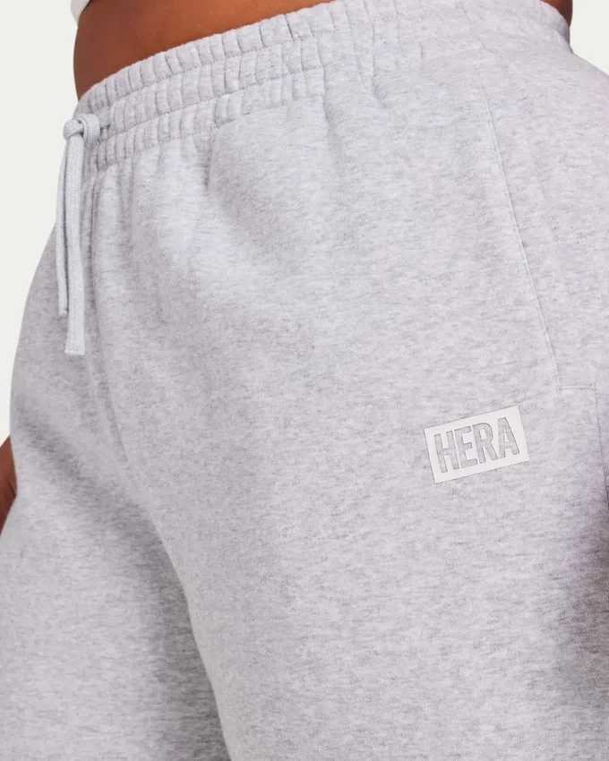Pantaloni sportivi da donna Collective a gamba larga – grigio melange Pantaloni sportivi da donna Collective a gamba larga – grigio melange