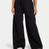 Pantaloni sportivi da donna Collective a gamba larga – nero Pantaloni sportivi da donna Collective a gamba larga – nero