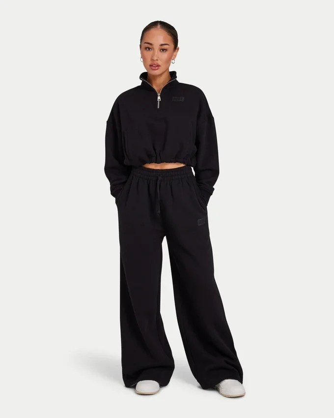 Pantaloni sportivi da donna Collective a gamba larga – nero Pantaloni sportivi da donna Collective a gamba larga – nero