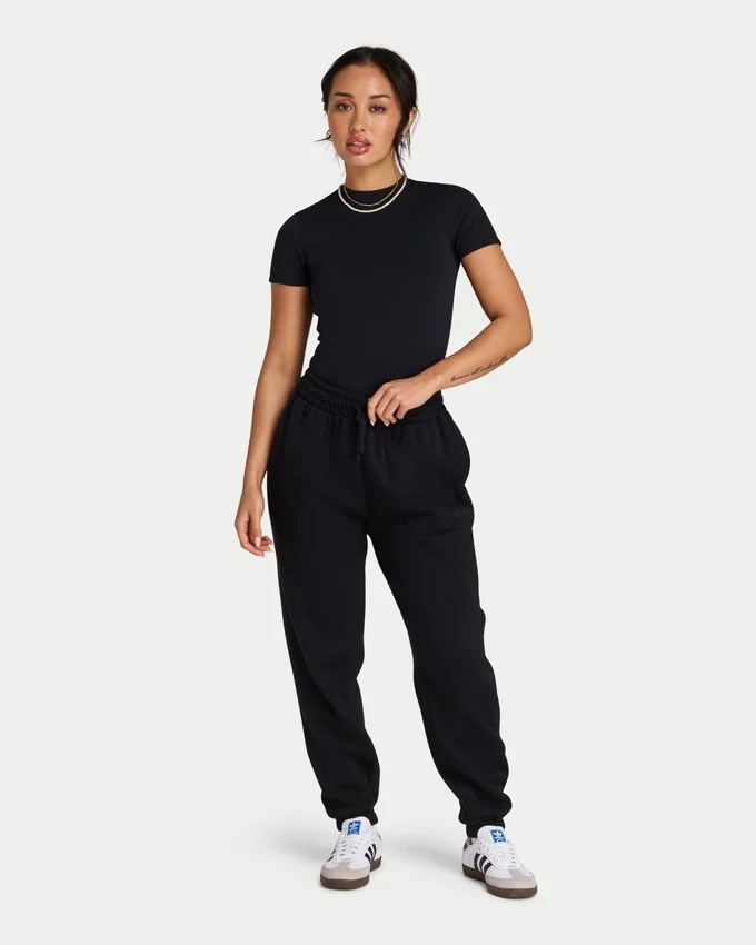 Pantaloni sportivi da donna The Collective – neri Pantaloni sportivi da donna The Collective – neri