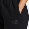 Pantaloni sportivi da donna The Collective – neri Pantaloni sportivi da donna The Collective – neri