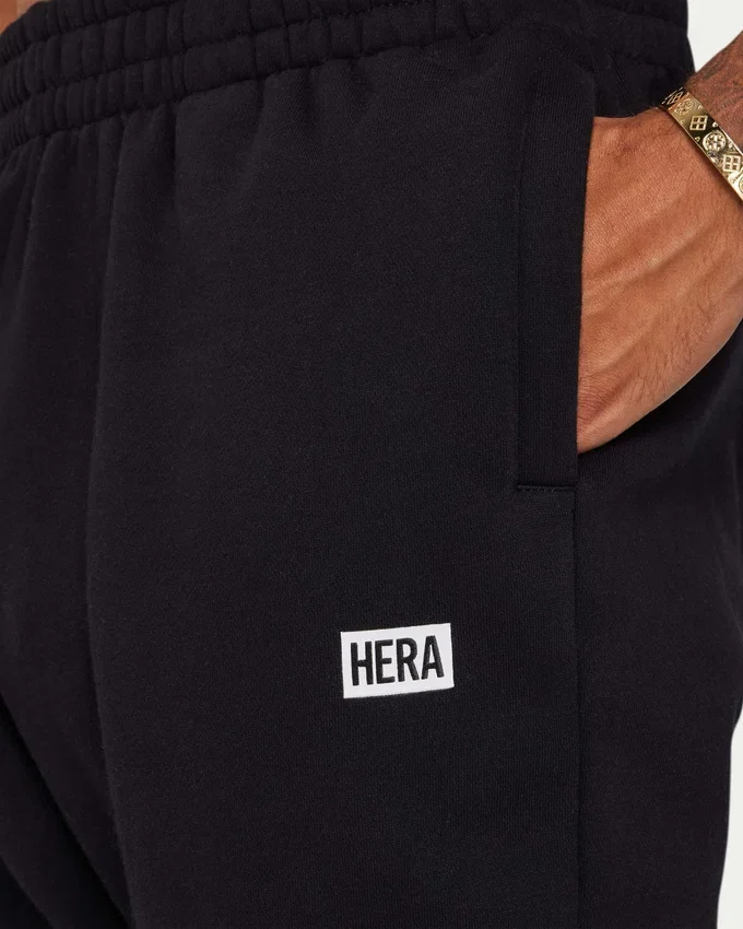 Pantaloni sportivi da uomo The Collective – neri Pantaloni sportivi da uomo The Collective – neri