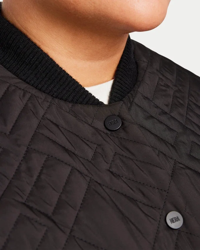 Piumino lungo da donna – nero Piumino lungo da donna – nero