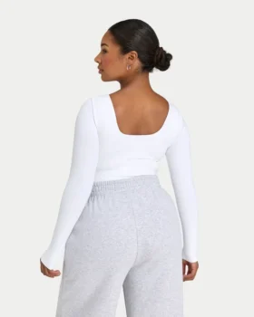 Top da donna essenziale a maniche lunghe dual wear – bianco