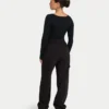 Top da donna essenziale a maniche lunghe dual wear – nero